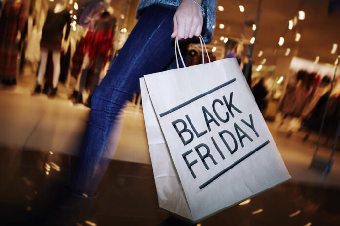 shopping woman holding bag on Black Friday shopping
