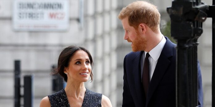 Britains Prince Harry and his fiancee Meghan Markle