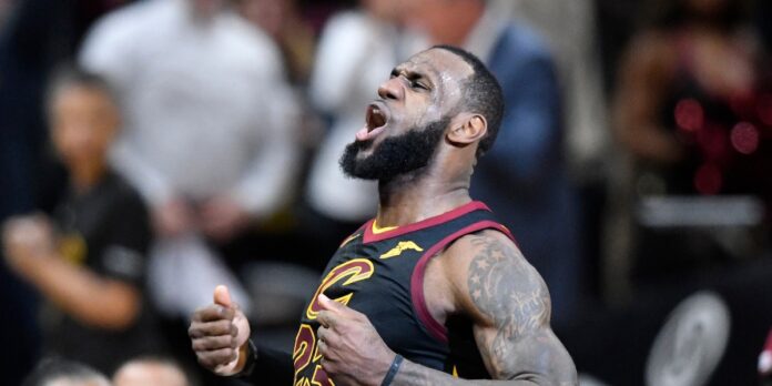 Cleveland Cavaliers forward LeBron James celebrates his game-winning three-point basket in the fourth quarter against the Indiana Pacers in game five of the first round of the 2018 NBA Playoffs