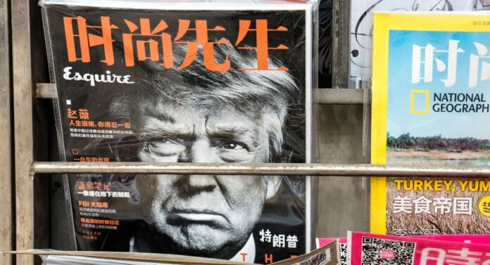 USA President Donald Trump is seen at the cover of a magazine at a news stand.