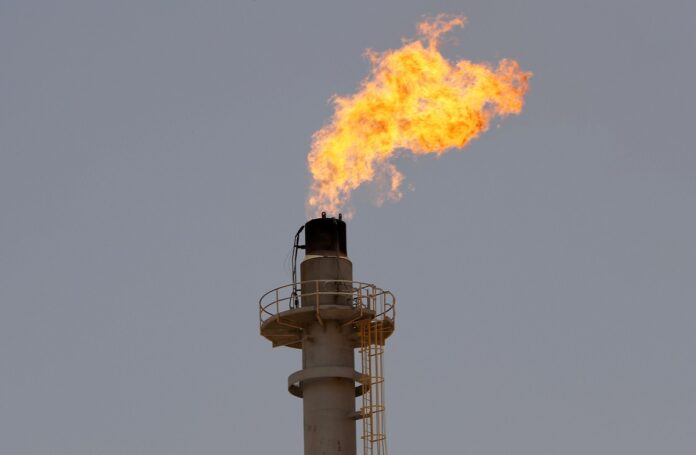 A flame is seen at Natural Gas Liquids (NGL) facility in Saudi Aramco's Shaybah oilfield, Saudi Arabia. REUTERS/Ahmed Jadallah