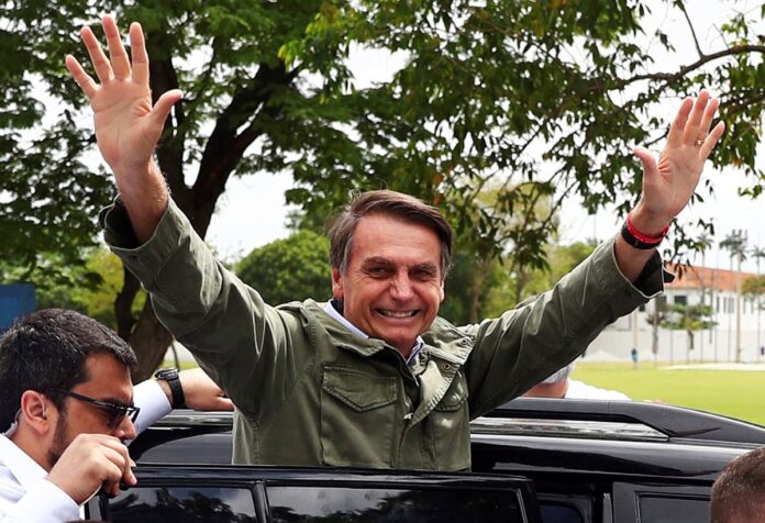 Jair Bolsonaro, far-right lawmaker and presidential candidate of the Social Liberal Party (PSL), gestures during a runoff election, in Rio de Janeiro, Brazil October 28, 2018. REUTERS/Pilar Olivares